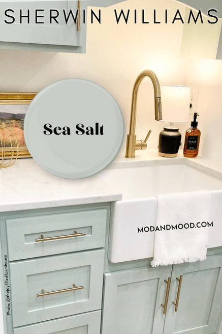 Swatch of sea salt over a background of the color on cabinets