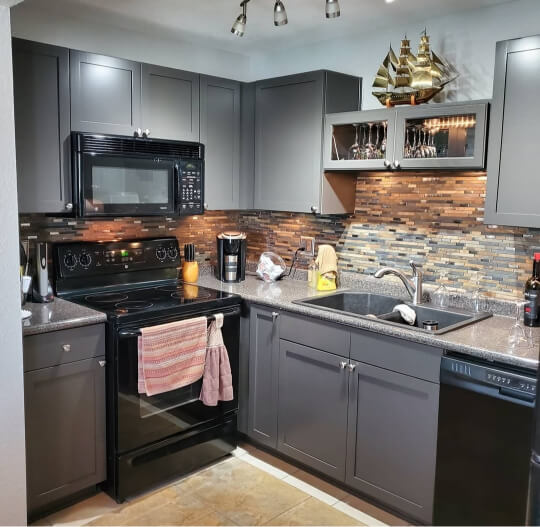 Sherwin Williams Black Fox on kitchen cabinets where it looks very charcoal.