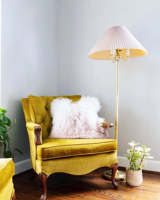 Benjamin Moore Gray Owl on walls behind a mustard colored chair