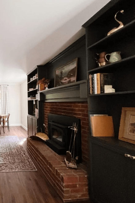 Sherwin Williams Urbane Bronze on built in cabinets in a living room.