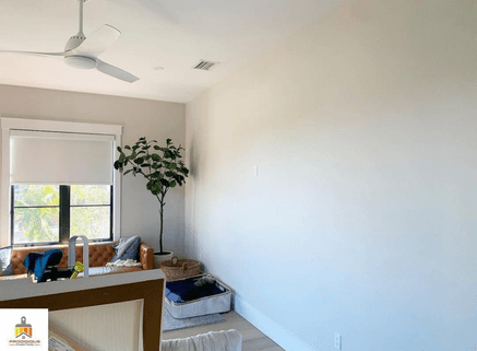 Sherwin williams Drift of Mist looking like a light greige in a living room.