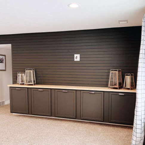 Sherwin Williams Iron ore where it looks warm and bronw in a living room