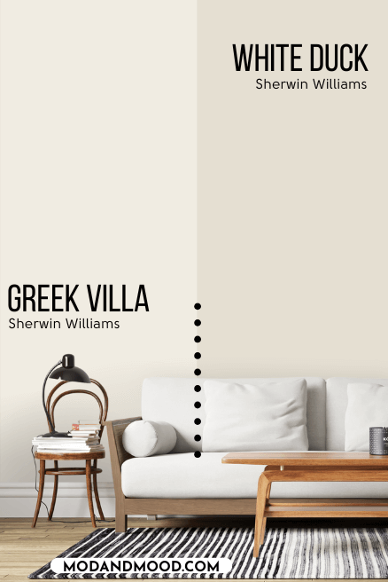 Sherwin Williams Greek Villa on half of a wall and White Duck on the other half behind a white sofa.