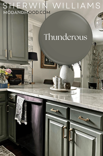 Swatch of Thunderous over a background of the color on kitchen cabinets