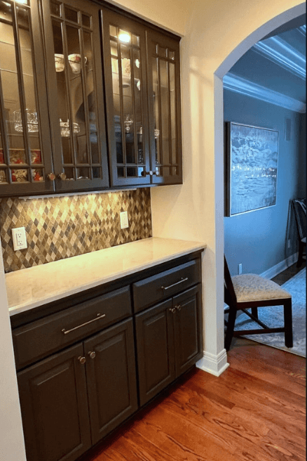 Sherwin Williams Urbane Bronze on built in cabinets in a walk through pantry