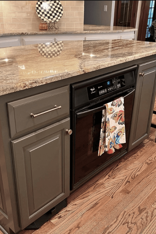 Sherwin Williams Urbane Bronze on an island with stone countertops