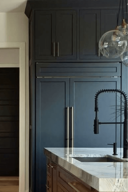 Benjamin Moore Blue Note on kichen cabinets where it looks like a sea blue with a gray overtone