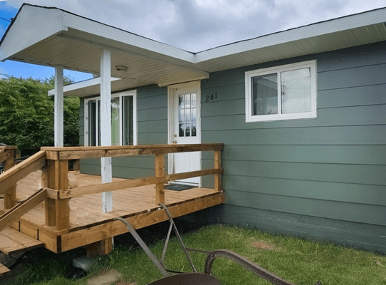 Benjamin Moore Backwoods on siding with white trim
