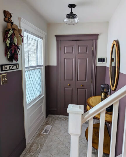 Benjamin Moore Pale Oak on the top 1/3 of a wall and Cinnamon Slate on the  lower 2/3.