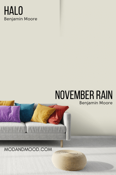 Benjamin Moore November Rain on half of a wall and Halo on the other half behind a light gray sofa with colorful cushions.