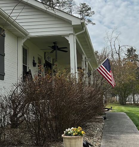 Dover White where it looks like Benjamin Moore November Rain on an exterior on an overcast day