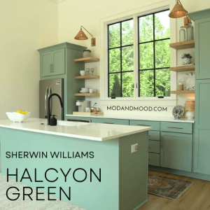 Sherwin Williams Halcyon Green on kitchen cabinets in a brand new creamy white walls kitchen