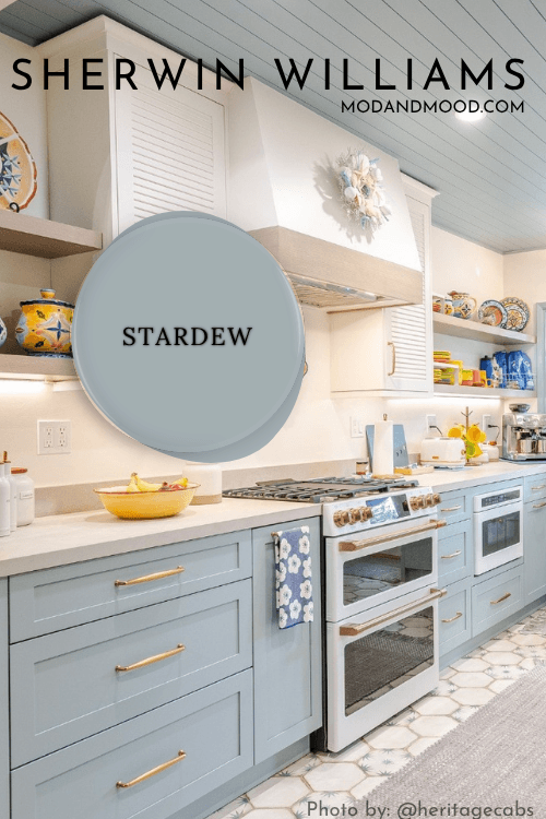 Swatch of Stardew over a background of the color on kitchen cabinets and a ceiling with cloud white walls and upper cabinets.