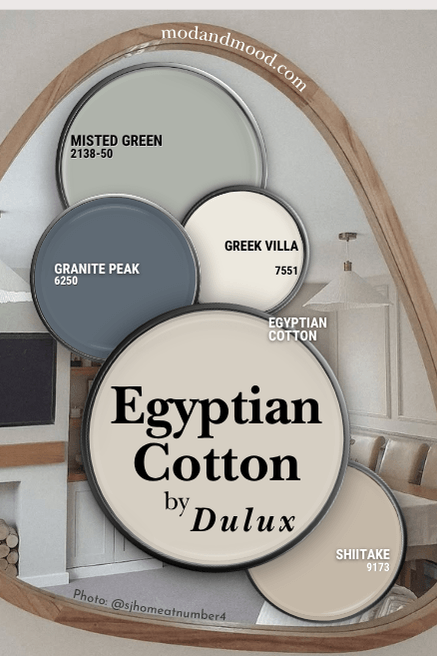 Dulux Egyptian Cotton with coordinating colors Benjamin Moore Misted Green, Sherwin Williams Greek Villa, Shiitake, and Granite Peak over a background of the color on walls reflected in a mirror.