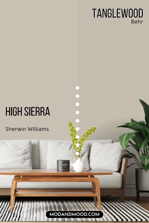 Behr Tanglewood a dupe for High Sierra on half of a wall and High Sierra on the other half behind a white sofa.