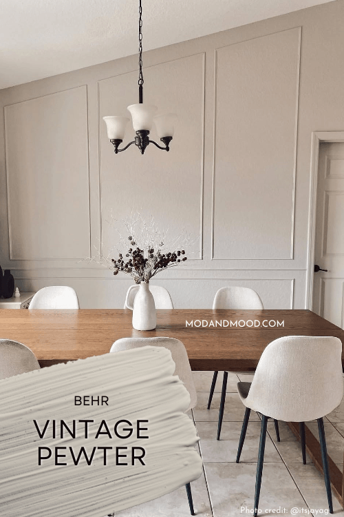 Swatch of Behr Vintage Pewter over a photo of the color on a feature wall in a dining room.