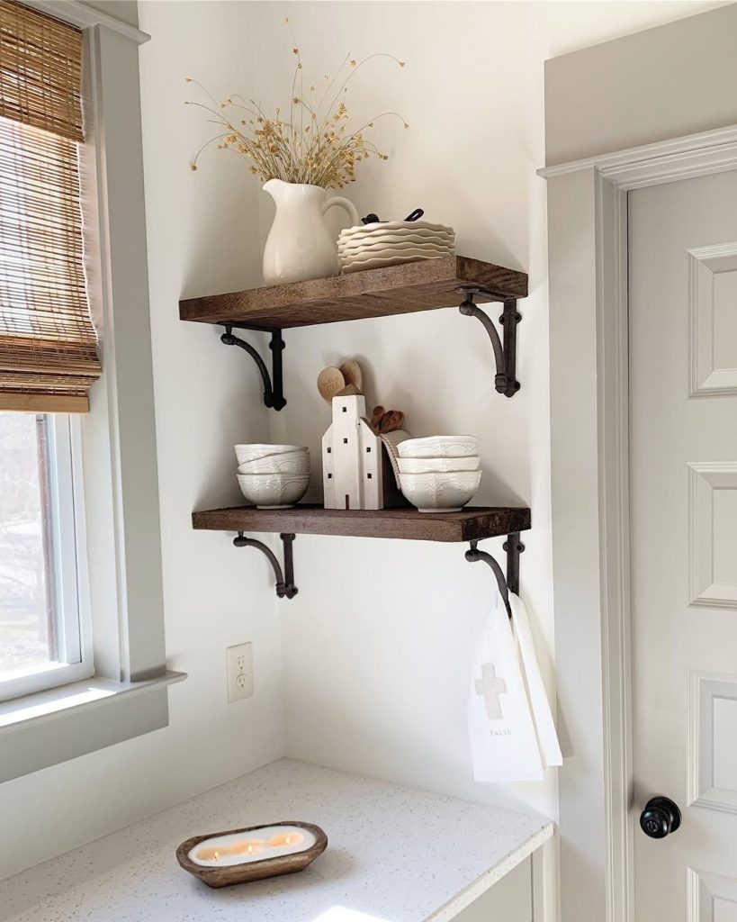 Sherwin Williams Dorian Gray looks like a light mushroom color on an interior door and trim with alabaster walls.