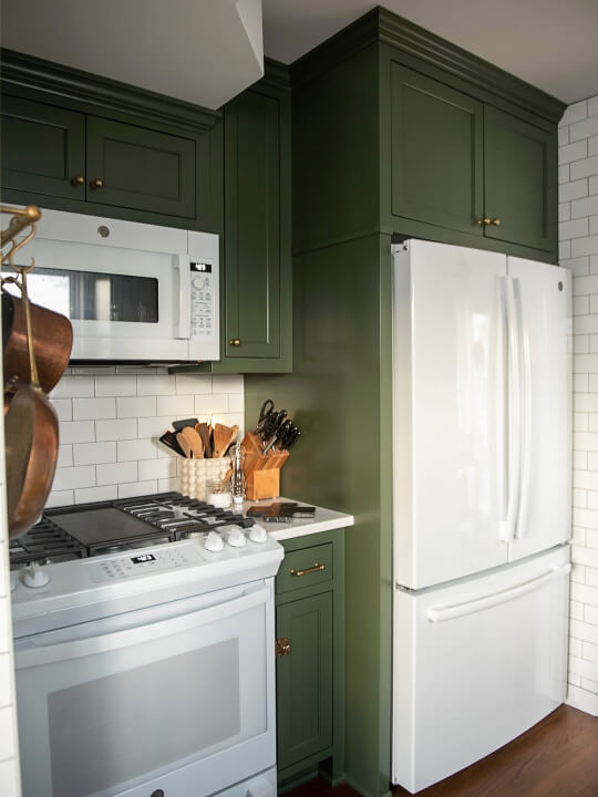 Sherwin Williams Rookwood dark green looking quite olive on cabinets