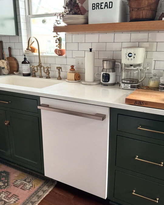 Sherwin Williams Rokkwood Dark green on lower cabinets where it looks very dark
