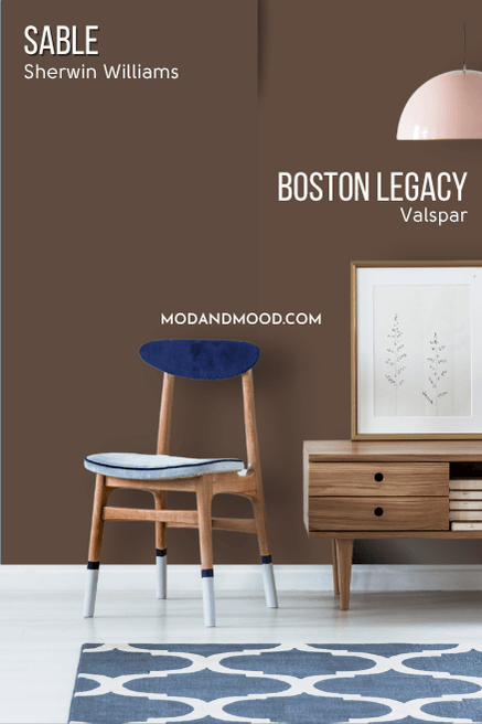 Sherwin Williams Sable on half of a wall and valspar dupe Boston Legacy on the other half behind a wood console table.