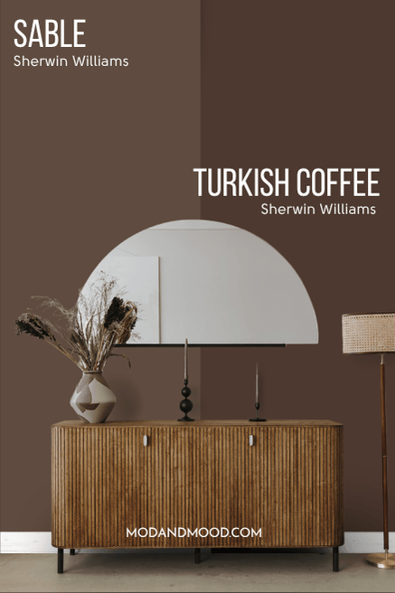 Sherwin Williams Sable on half of a wall and Turkish Coffee on the other half behind a half moon mirror and wood hall table