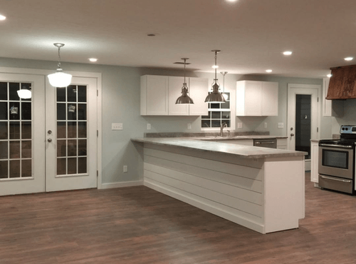 Sherwin Williams Spare White on kitchen cabinets with sea salt walls
