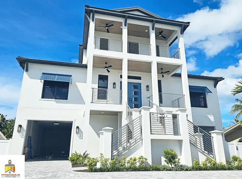 Sherwin Williams Spare White on a stucco exterior.
