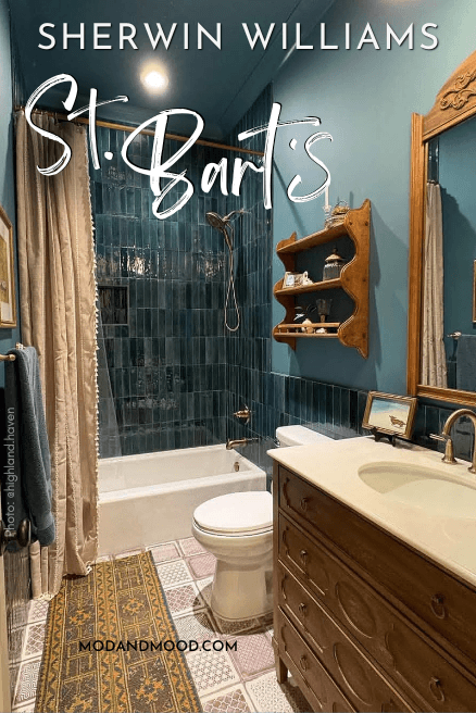 Sherwin Williams St. Barts on walls, trim, and ceiling in a color drenched bathroom with matching tile and wood shelves, vanity, and mirror.