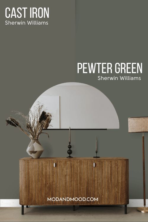 Sherwin Williams Cast Iron on half of a wall and Sherwin Williams Pewter Green on the other half behind a wood hall table and half moon mirror