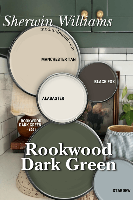 Sherwin Williams Rokkwood Dark green in a color palette with coordinating colors Manchester Tan, Alabaster, Black Fox, and Stardew all displayed on paint lids over a photo of the color on cabinets.
