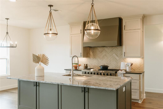 Sherwin Williams Cast Iron on a range hood and island with Shiitake wall cabinets.