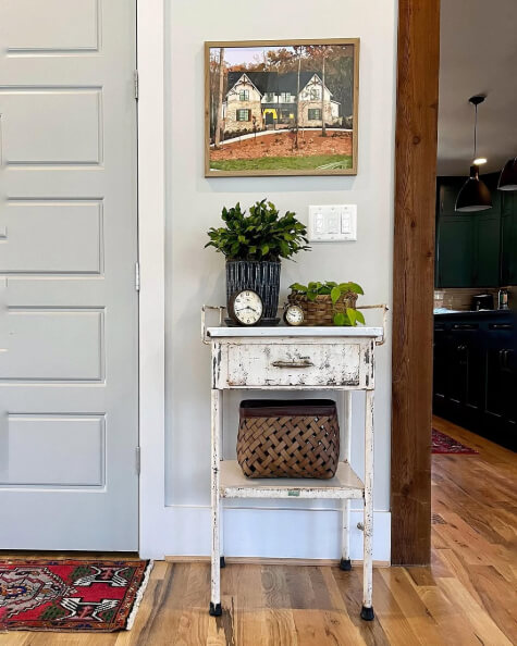 Sherwin Williams Light French Gray on an interior door with white trim and light gray walls