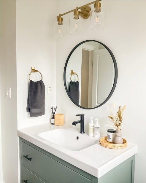Sherwin Williams Spare White on walls in a bathroom with retreat on a vanity