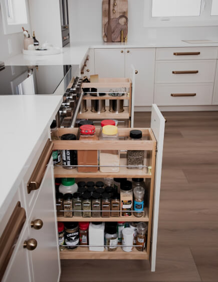 Wind's breath on lower cabinets with pull out sliding spice drawers