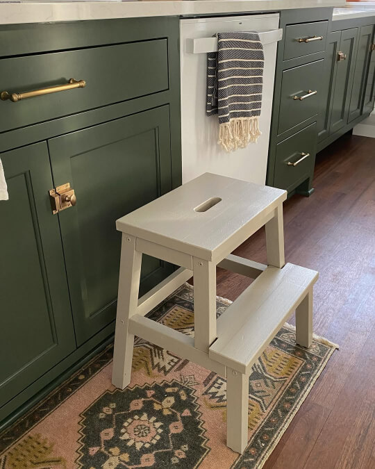 Rookwood dark green on cabinets with a pashmina stool in front