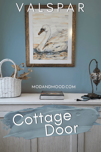 Valspar Cottage Door on a wall behind a cabinet and framed photo